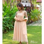 Peach shade panel-cut faux georgette kurti