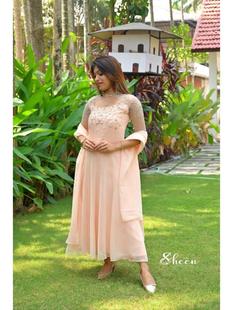 CB5B6A0C-9ABC-455D-9329-CABB0C05DD62 (1) Peach shade panel-cut faux georgette kurti - Image 1