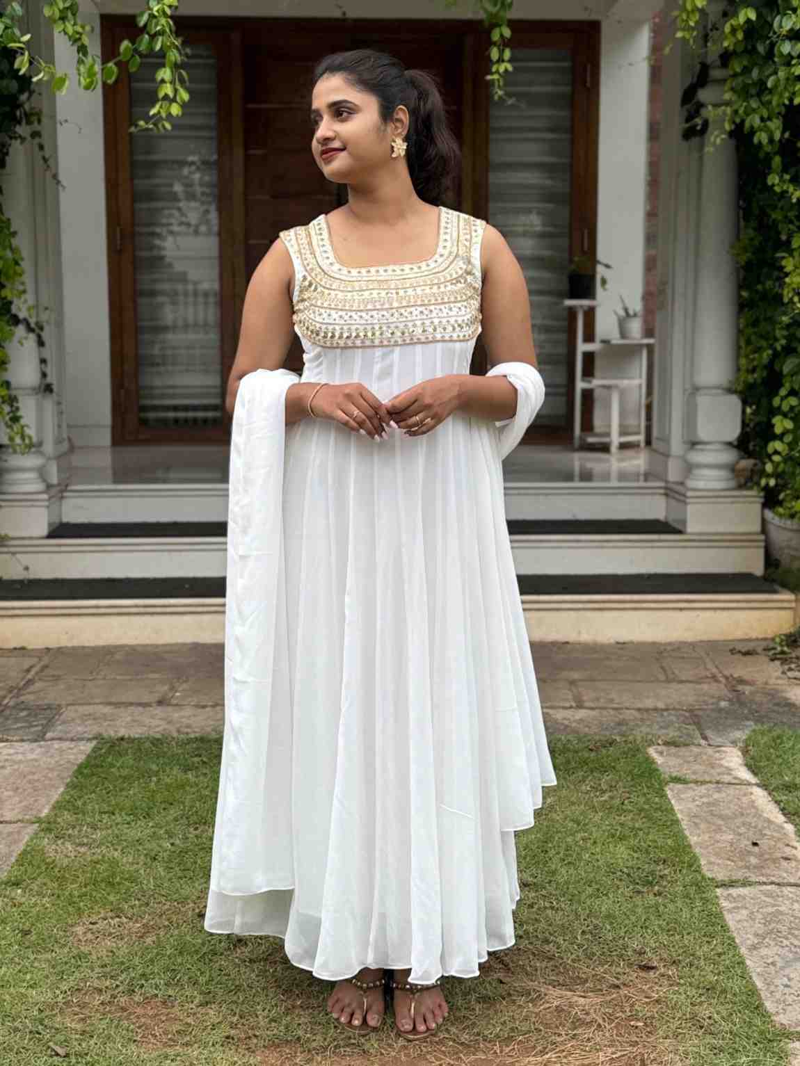 EB260597-EE69-4430-B875-CDF96C325B68 offwhite georgette panel cut kurti - Image 1