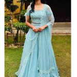 pastel blue shade ensemble featuring crop top and skirt