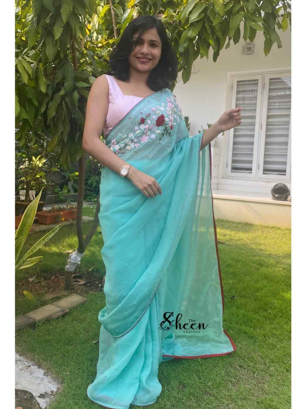 3212602A-8226-495E-8D26-9C9DCFC5544C (1) Premium pure viscose organza turquoise green saree - Image 1