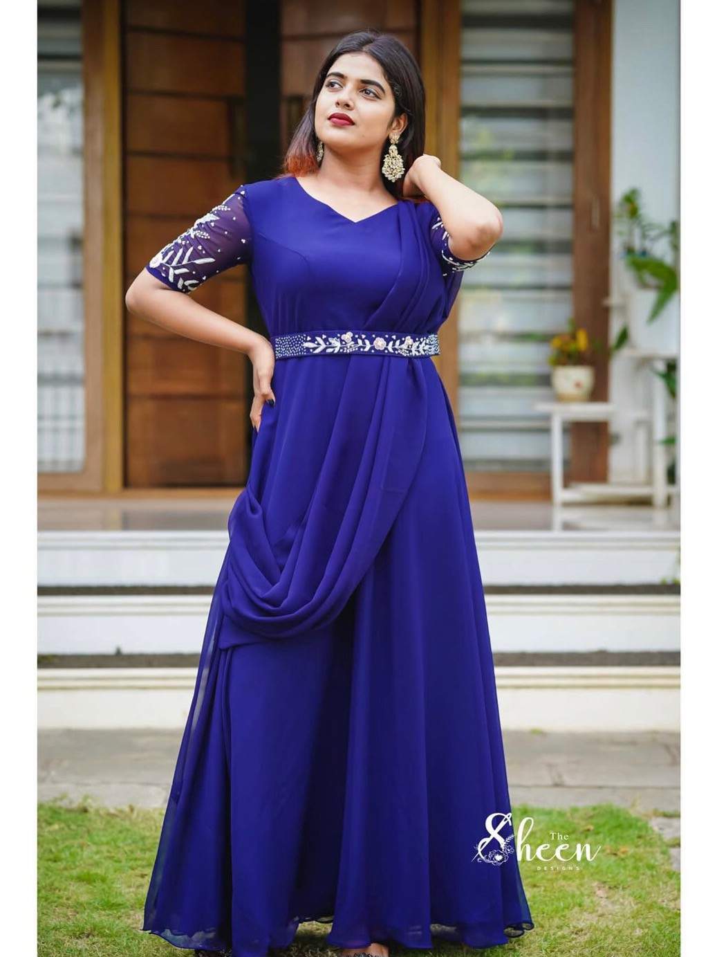 3358E7B9-CA10-4475-A885-9EA4BB5DB375 (1) dark blue draped gown - Image 1