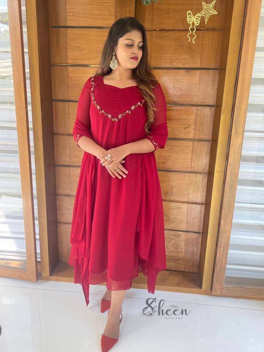 5BC8CA3F-5221-4717-B5D3-CD5B4B1F397D (1) Reddish maroon georgette A-line kurti - Image 1