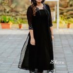 black shade A-line sleeveles gown paired with heavy handwork jacket