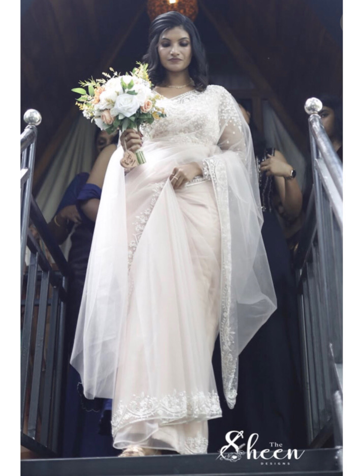 789CE054-633F-4F5B-9DFC-E285B45D2DF6 Pastel pink bridal saree - Image 1