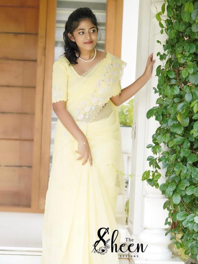 885021C5-F789-4F3A-8E94-346C08A0CDEF (1) Light yellow synthetic net cotta saree - Image 1