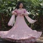 peachish pink shade crop top, skirt and duppatta
