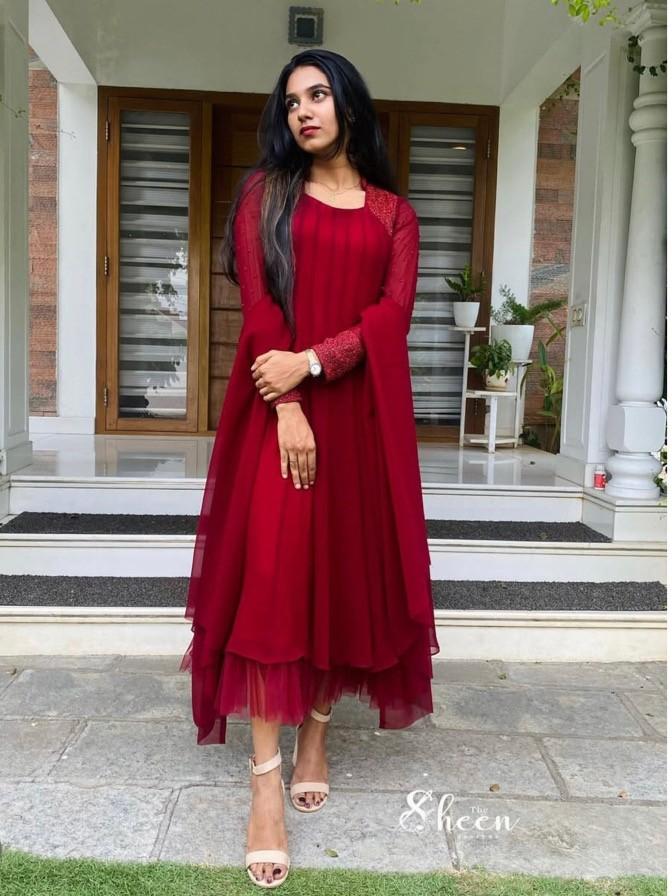 C2B025A1-AB9B-4FF5-92D8-A13587EFEBB7 (1) Reddishmarron shade panel-cut faux georgette kurti - Image 1