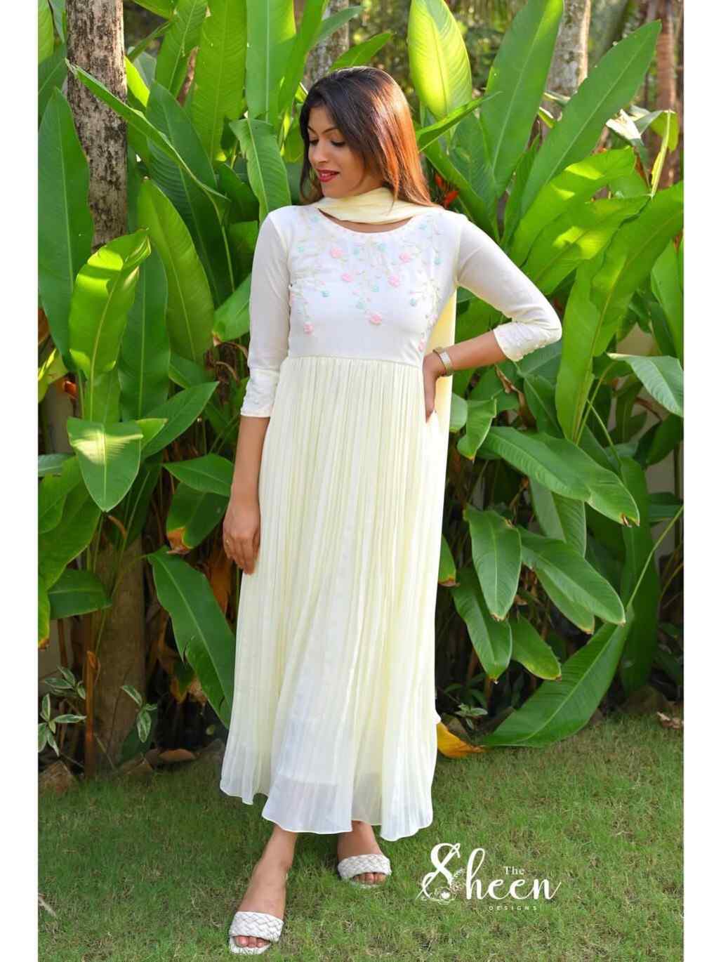C508F4F5-56CF-4A5B-B3B9-852ECD953656 (1) Pastel yellow faux georgette kurti - Image 1