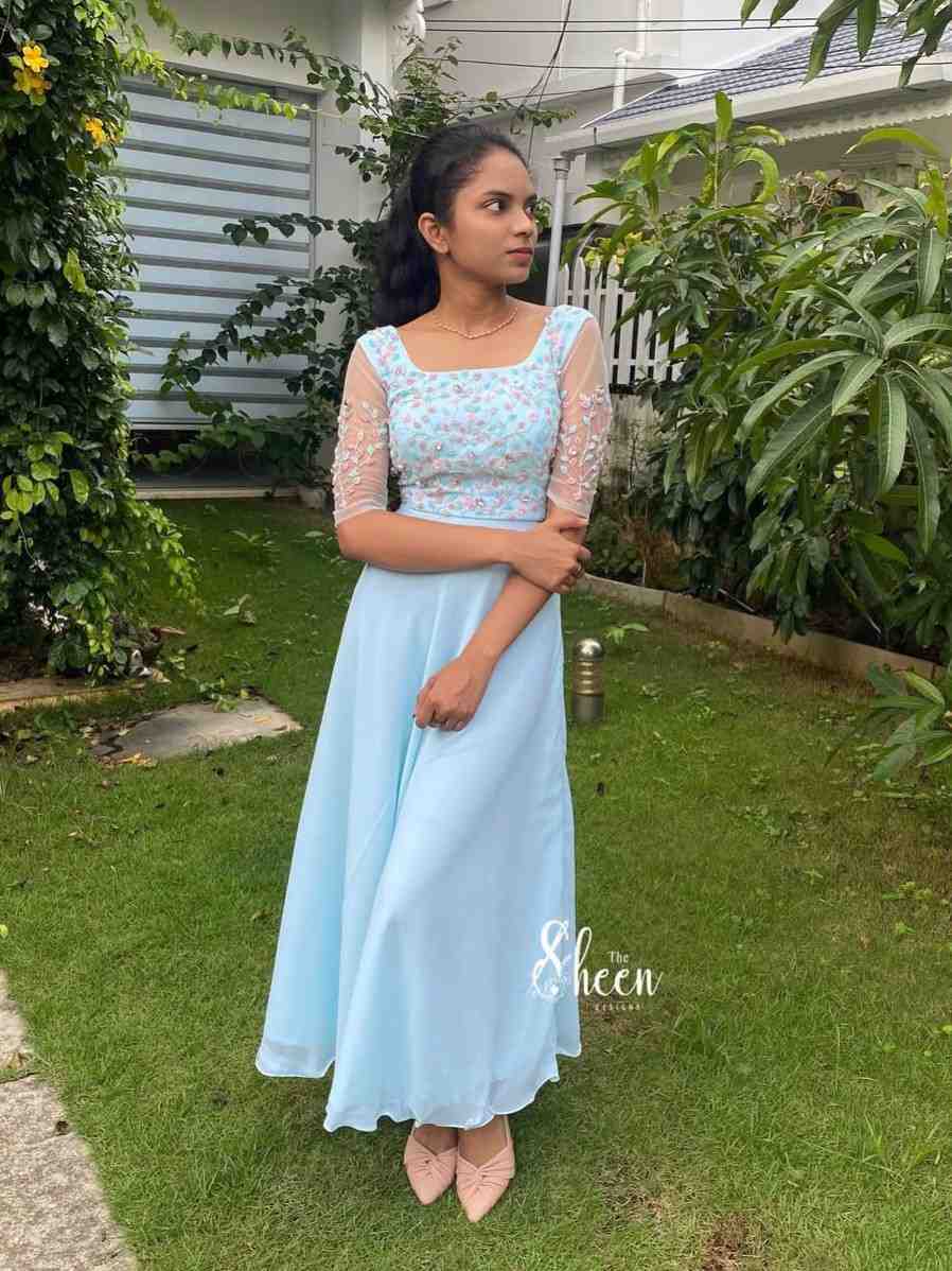 E993F004-0971-493C-AE09-11C356BAF486 (1) Sky-blue gown - Image 1