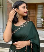 Dark green silky georgette saree - Image 2