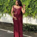 maroon semi-crepe draped saree